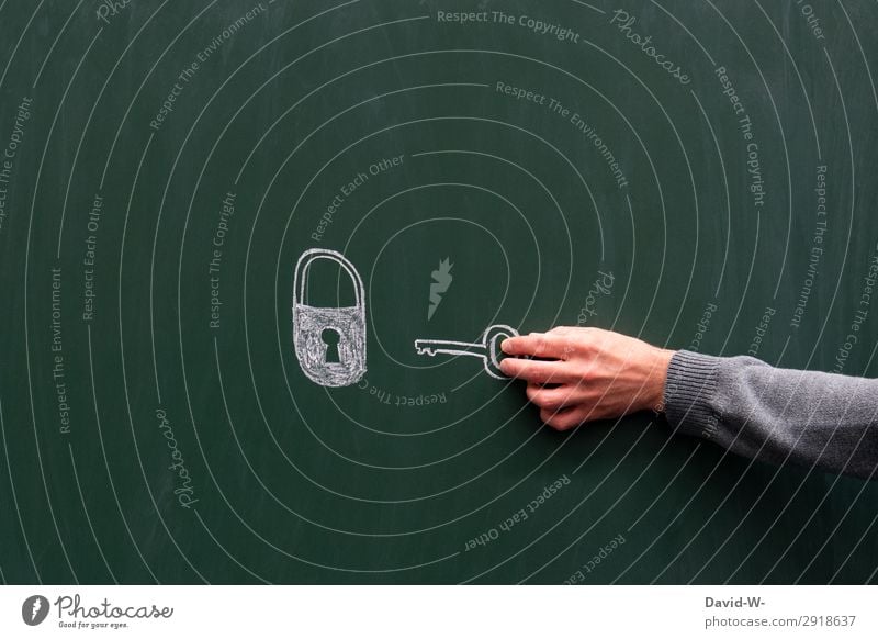 The hand leads the key to the lock Key Lock Padlock by hand Unlock Safety locked open Protection