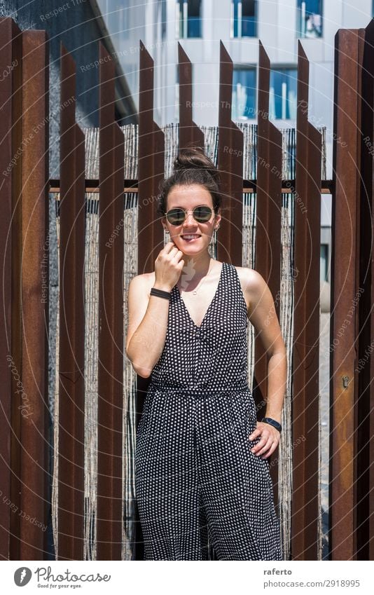 Pretty young stylish woman standing at fence Elegant Style Beautiful Vacation & Travel Human being Feminine Young woman Youth (Young adults) Woman Adults 1