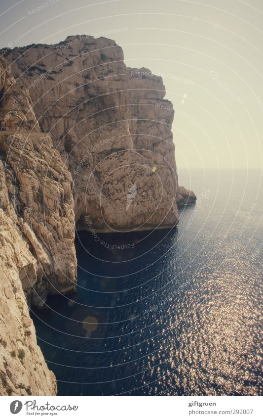 great wide open Environment Nature Landscape Elements Earth Water Sky Cloudless sky Sun Rock Waves Coast Ocean Island Large Sardinia Italy Rocky coastline Steep