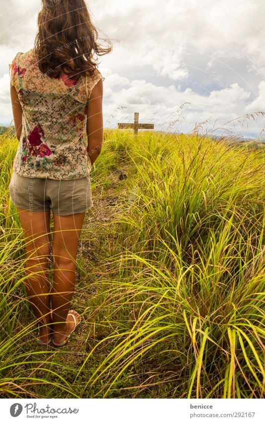 At the grave Woman Human being Grave Death Crucifix Christian cross Cemetery Stand Prayer To talk Back Grief Sadness Funeral Religion and faith Grass Meadow