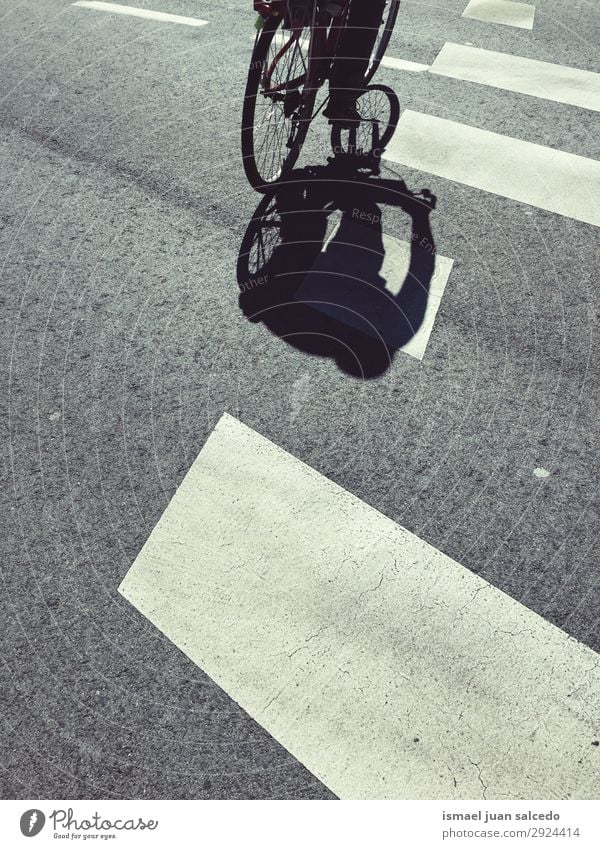 man on the bicycle shadow silhouette in the street Bicycle Sunlight Shadow Silhouette Ground Asphalt background Abstract Transport Cycling Cycle Car seat Wheels