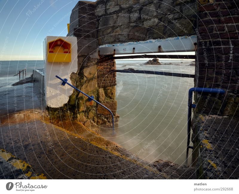 bathing area Landscape Water Sky Cloudless sky Horizon Autumn Climate Beautiful weather Rock Coast Ocean Village Deserted Gate Swimming pool Wall (barrier)