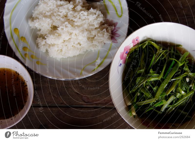 Cambodian Morning Glory. Food Meat Nutrition Eating Lunch Dinner morning glory Rice fish stock fish sauce Spicy Crockery Bowl Painted Wooden table Vegetable