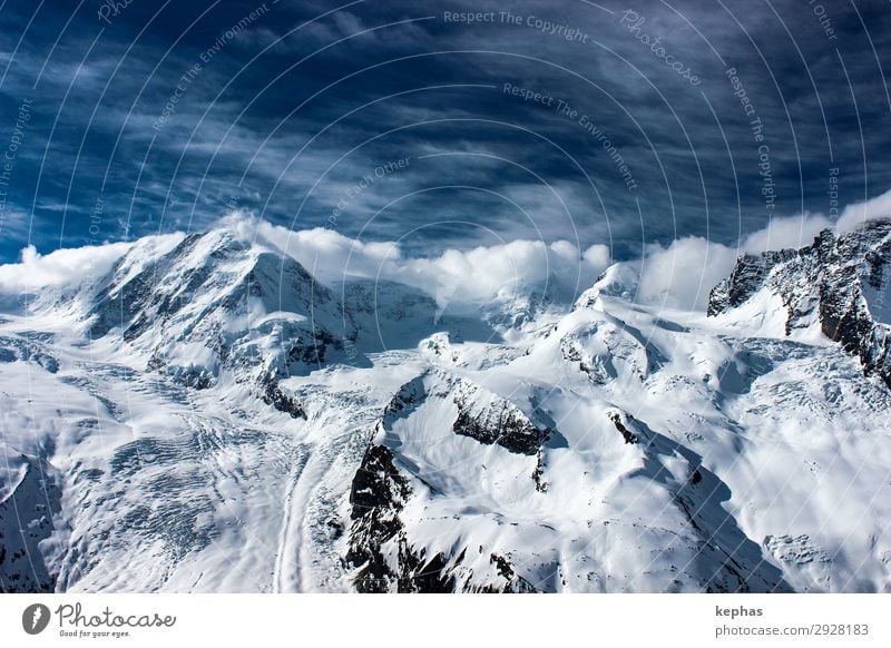 Four thousand meters in clouds Mountain Environment Nature Landscape Elements Sky Clouds Winter Alps Canton Wallis Switzerland Peak Snowcapped peak Glacier