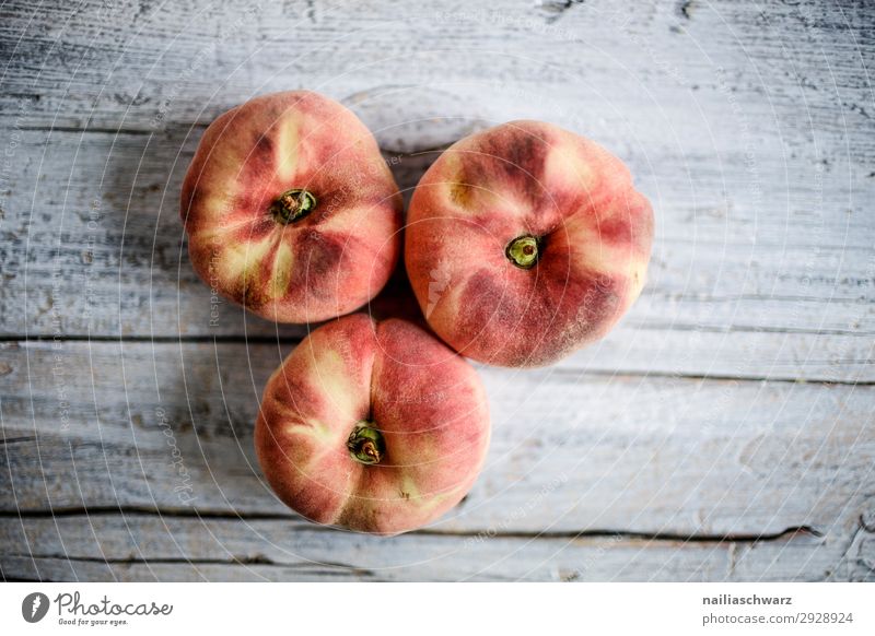 Three peaches Food Fruit Peach Nutrition Eating Organic produce Vegetarian diet Diet Snowboard Wood Fragrance Healthy Delicious Natural Juicy Sweet Yellow Gray