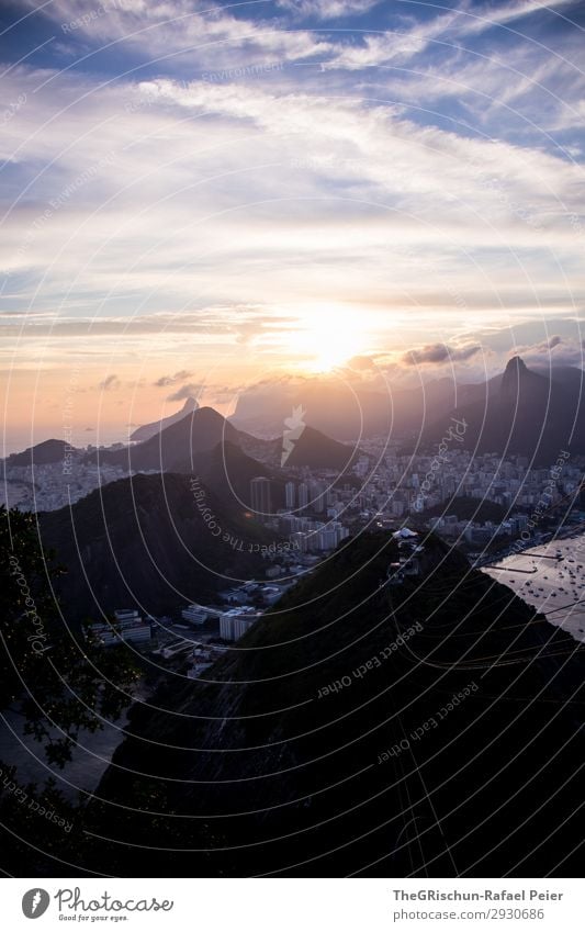 sugar mountains Environment Nature Blue Yellow Gold Violet Black Clouds Mountain Sunset Back-light Town City Rio de Janeiro Brazil House (Residential Structure)