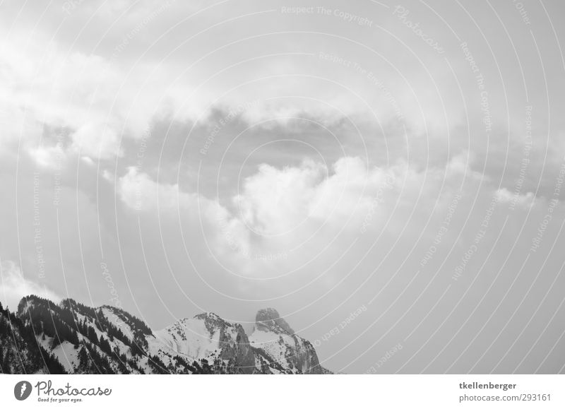 Which are the real Mountains? Nature Landscape Sky Clouds Storm clouds Winter Rock Alps Peak Snowcapped peak Aggression Threat Simple Gray Gap in the clouds