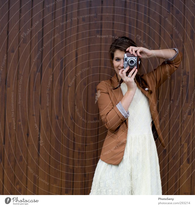 Vintage photographer Camera Feminine Woman Adults Head Arm 1 Human being Hip & trendy Brown Enthusiasm Creativity Photography Colour photo Exterior shot