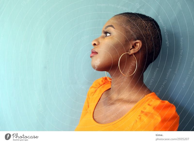 woman with earring Feminine Woman Adults 1 Human being Shirt Cloth Earring Black-haired Short-haired Observe Think Looking Wait pretty naturally Moody