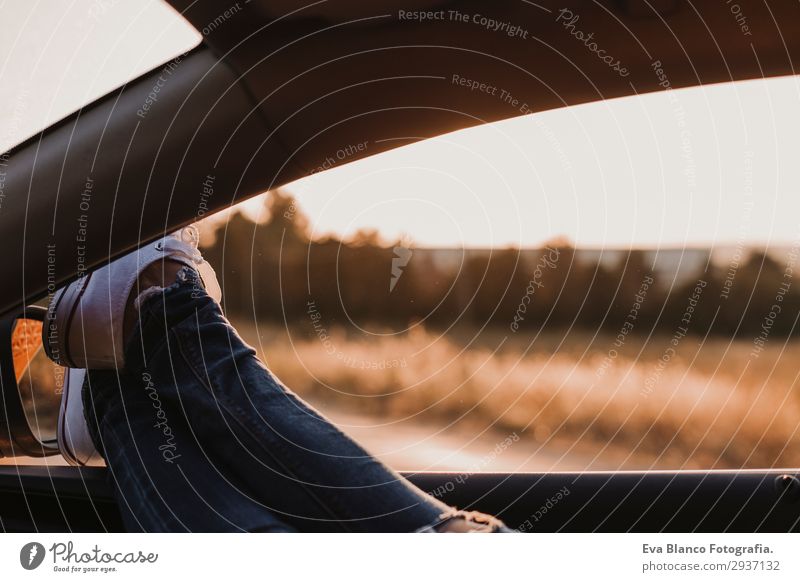 Modern hipster girl resting in a car and admiring views Lifestyle Joy Relaxation Vacation & Travel Trip Adventure Summer Sun Human being Feminine Young woman