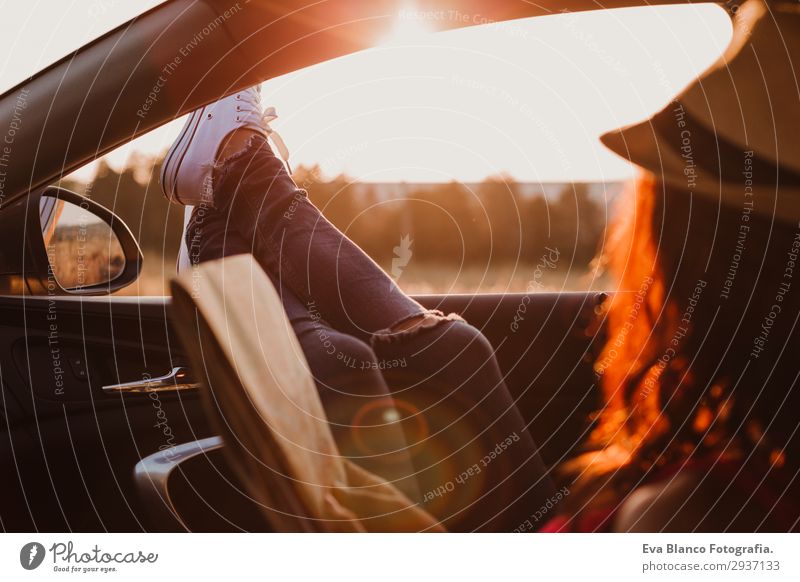 Modern hipster girl resting in a car reading a map Lifestyle Joy Relaxation Reading Vacation & Travel Trip Adventure Summer Sun Feminine Young woman