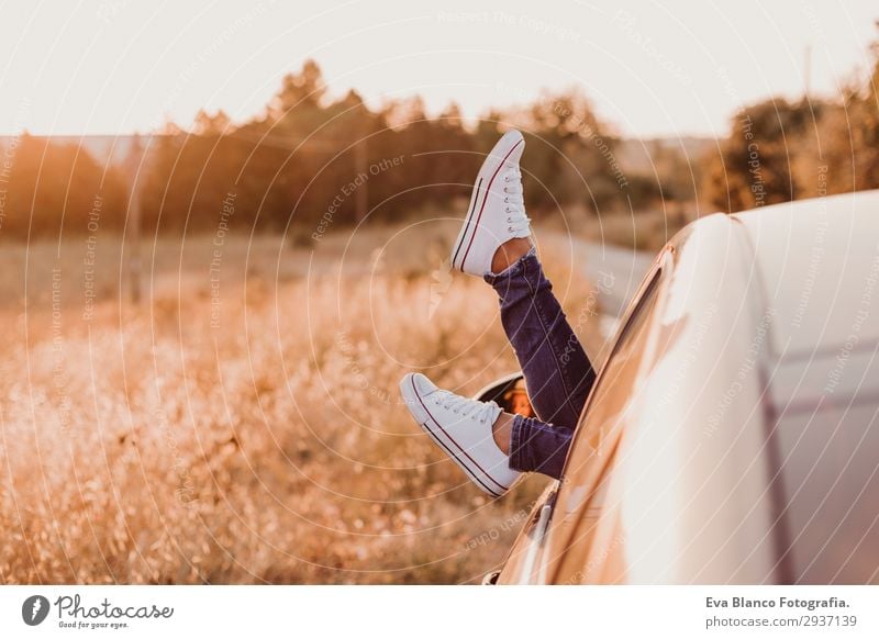 Modern girl resting in a car and admiring view Lifestyle Joy Relaxation Vacation & Travel Trip Adventure Summer Sun Human being Feminine Young woman