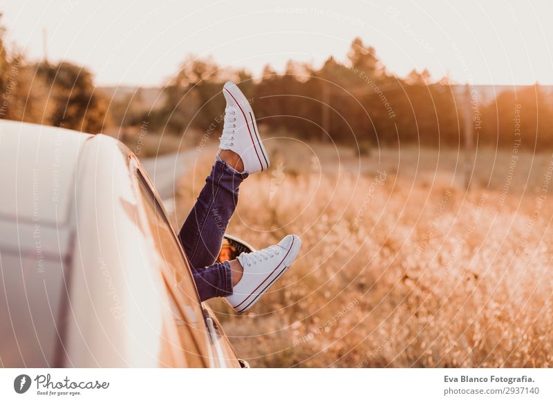 Modern girl resting in a car and admiring view Lifestyle Joy Relaxation Vacation & Travel Trip Adventure Summer Sun Feminine Young woman Youth (Young adults)