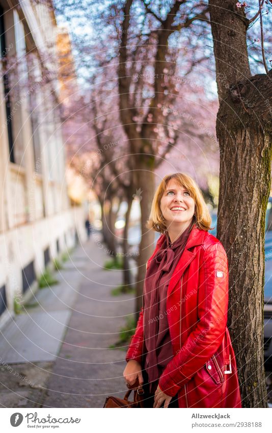 young woman leans on a tree and enjoys cherry blossoms Europe Italy Rome Town City Vacation & Travel Travel photography Blue sky Spring Blossom Cherry blossom