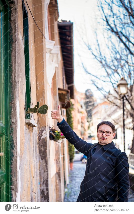 Thumbs up with a cactus Italy Rome Sightseeing City trip Town Travel photography Vacation & Travel Trip Wall (building) Portrait photograph Young man Cactus