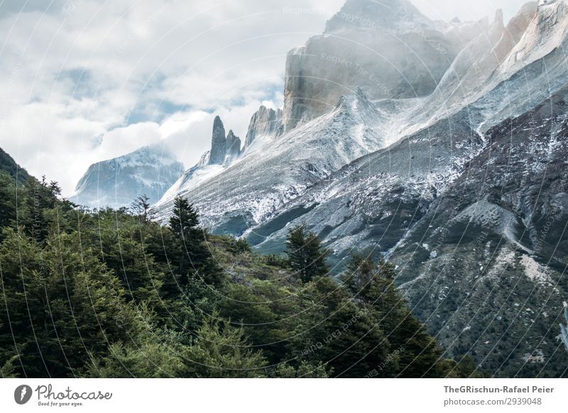 Impressive mountain world Environment Nature Landscape Blue Gray Black White Patagonia Mountain Chile Wind National Park Torres del Paine NP Hiking Rough Snow