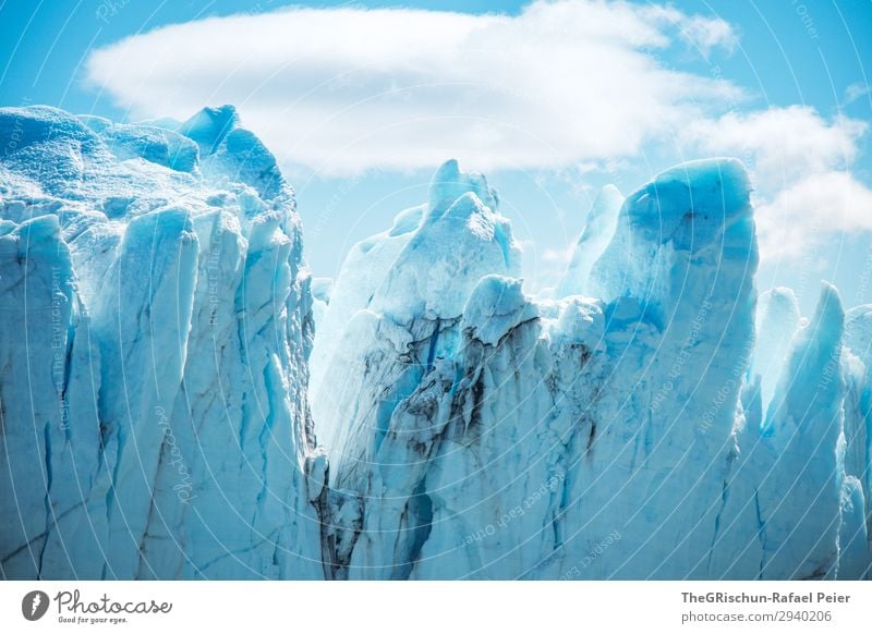 iceberg Nature Landscape Blue Turquoise White Snow Ice Glacier Perito Moreno Glacier Dirty Crack & Rip & Tear Point Clouds To break (something) Colour photo