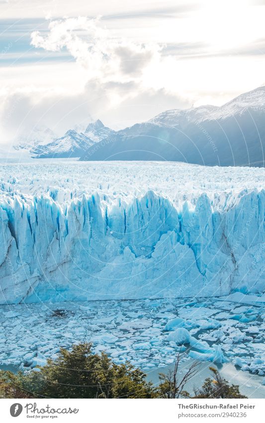 Perito Moreno Glacier Nature Blue Turquoise White Shadow Light Back-light Sunset Ice Snow Ice floe To break (something) Crack & Rip & Tear Mountain Argentina