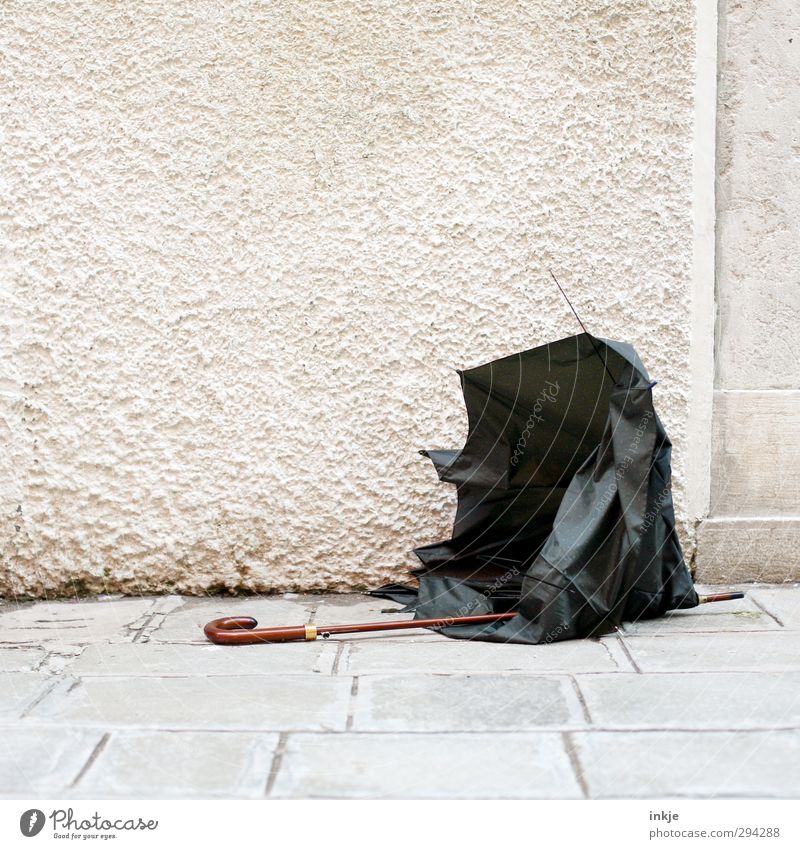 the day after (on the tracks of dioxin and zabalotta) Weather Wind Gale Rain Deserted Footpath Sidewalk Wall (barrier) Wall (building) Facade Umbrella Stone