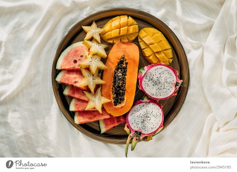 Various exotic tropical fruits on a metal tray in bed Bedroom Breakfast Carambole Cut Delicious Dessert Diet Dragonfruit Exotic flat flatlay Food Healthy Eating