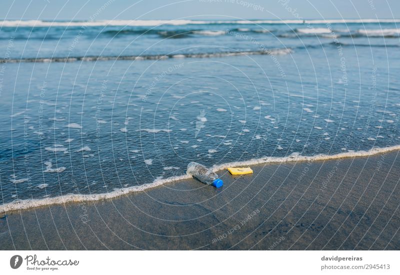 Garbage on the seashore Beach Ocean Environment Nature Landscape Sand Coast Tin Plastic Dirty Disaster Environmental pollution contamination plastic bottle