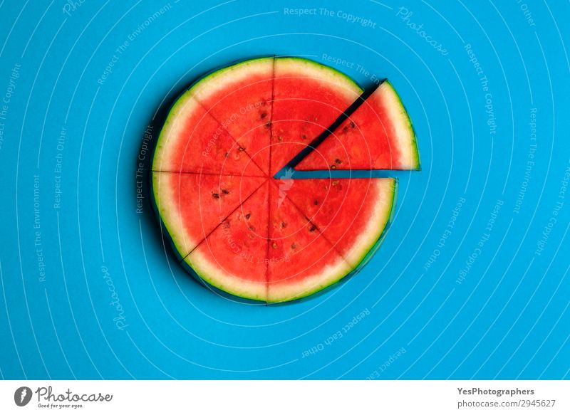 Sliced watermelon on blue background. Above view. Fruit Dessert Organic produce Vegetarian diet Diet Lifestyle Healthy Eating Vacation & Travel Summer