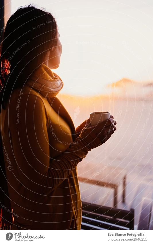 woman enjoys fresh coffee at sunset at the beach Breakfast Beverage Coffee Espresso Tea Lifestyle Happy Beautiful Relaxation Beach Human being Feminine