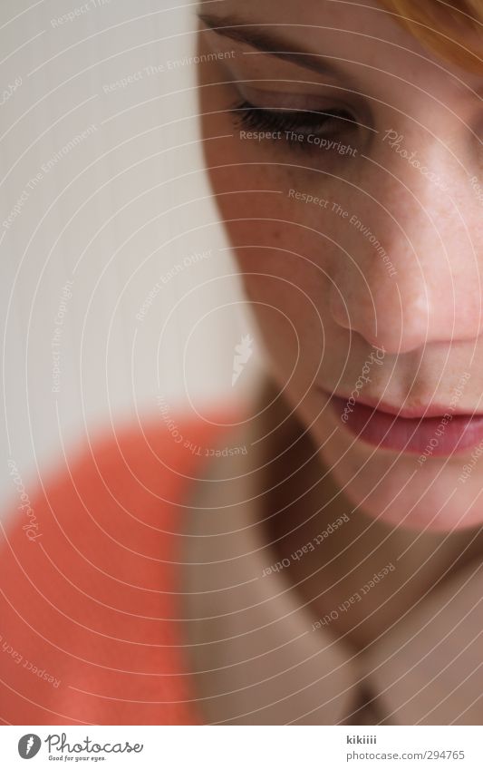 Greta Portrait photograph Nose Mouth Partially visible salmon-coloured Orange Pink Blur Shallow depth of field Downward Collar Blouse Think Meditative Sadness