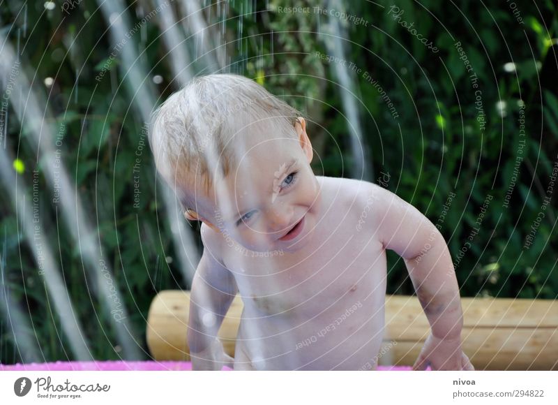 Shower pleasing Boy (child) Skin Chest 1 Human being Water Sun Plant Garden Swimming & Bathing Discover smile Playing Stand Happiness luck green Joy