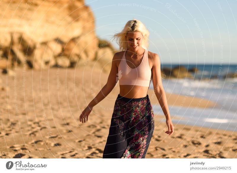 Woman enjoying the sunset on a beautiful beach Lifestyle Happy Beautiful Body Relaxation Leisure and hobbies Vacation & Travel Freedom Summer Sun Beach Ocean