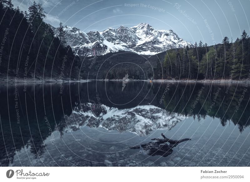 Sunrise at Eibsee in front of Zugspitze Mountain Nature Landscape Water Sky Clouds Sunset Spring Tree Forest Alps Lake Adventure Climate Stagnating Environment