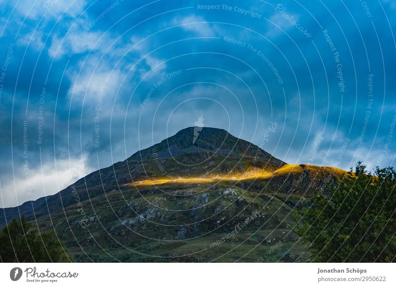 last sunbeam at the mountain Highlands, Scotland Environment Nature Landscape Sky Sunrise Sunset Sunlight Beautiful weather Rock Mountain Esthetic Exceptional