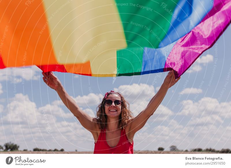 Woman holding the Gay Rainbow Flag over blue sky outdoors Lifestyle Joy Happy Leisure and hobbies Freedom Summer Sun Wedding Human being Feminine Homosexual