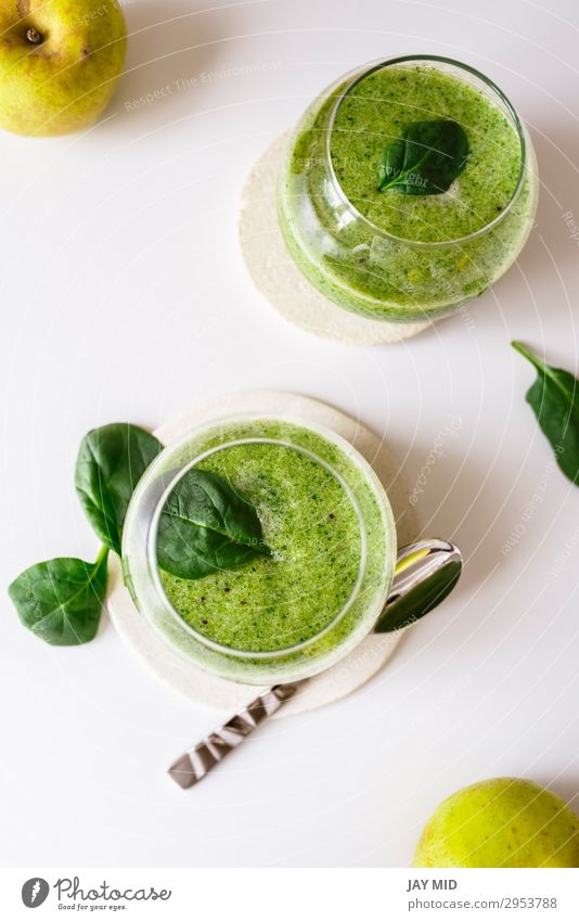 Healthy green smoothie. Superfood Vegetable Fruit Apple Nutrition Organic produce Vegetarian diet Slow food Beverage Drinking Cold drink Juice Table Fresh