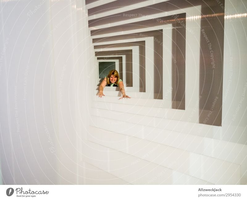 Portrait of a young woman in several frames 1 Person Young woman Portrait photograph Central perspective Frame Tunnel Interior shot Studio shot Illusion Joy