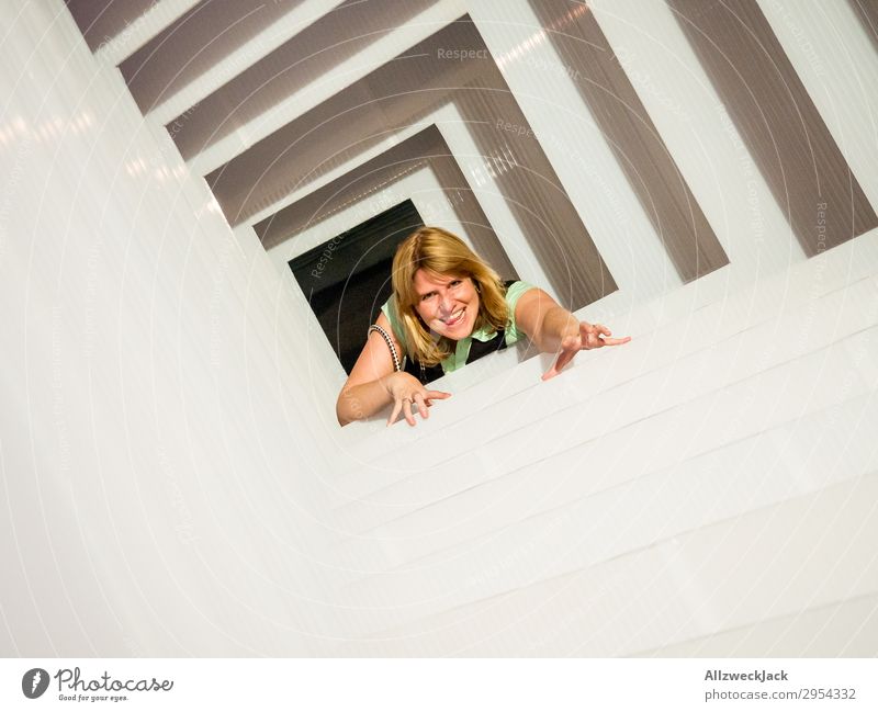 Portrait of a young woman in several frames 1 Person Young woman Portrait photograph Central perspective Frame Tunnel Interior shot Studio shot Illusion Joy