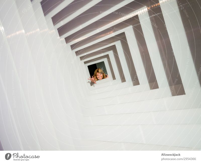 Portrait of a young woman in several frames 1 Person Young woman Portrait photograph Central perspective Frame Tunnel Interior shot Studio shot Illusion Joy