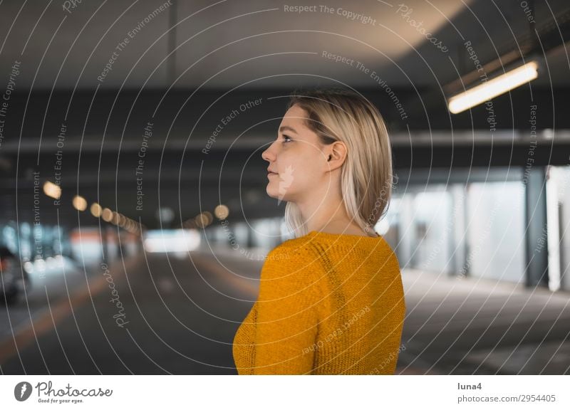 thoughtful young woman in parking garage Lifestyle Happy pretty Contentment Relaxation Leisure and hobbies Summer University & College student Young woman