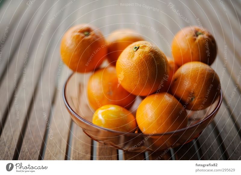 false orange Bowl Wood Healthy Orange Table Fruit Tropical fruits Citrus fruits Colour photo Copy Space left Copy Space top Shallow depth of field