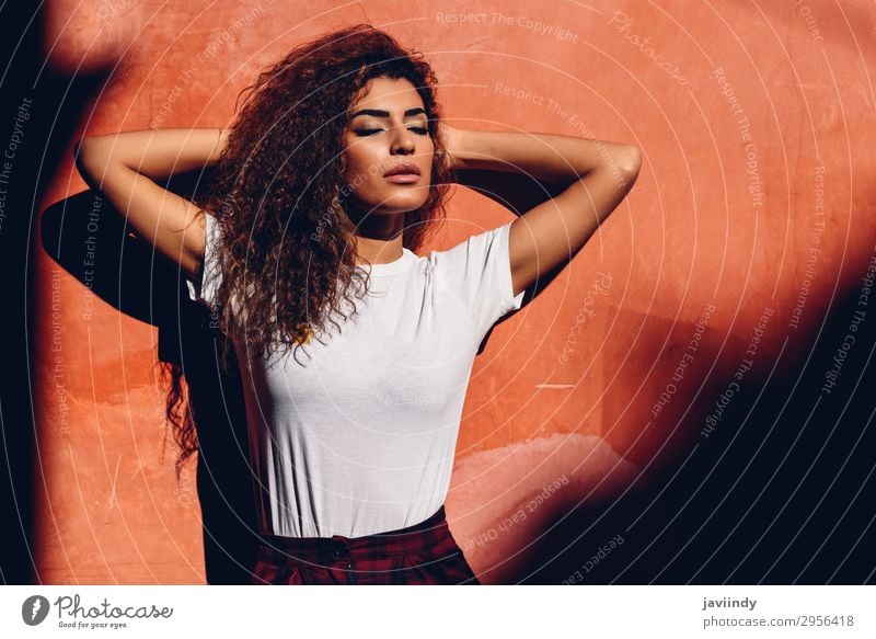 Arab girl in casual clothes in the street to the sun. Lifestyle Beautiful Hair and hairstyles Face Summer Sun Human being Feminine Young woman