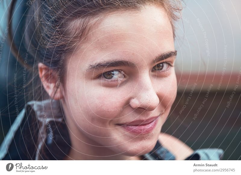 portrait of a smiling teenage girl with lifejacket woman smile female teenager closeup life-jacket water sports boat bun summer outdoor travel canoeing vacation