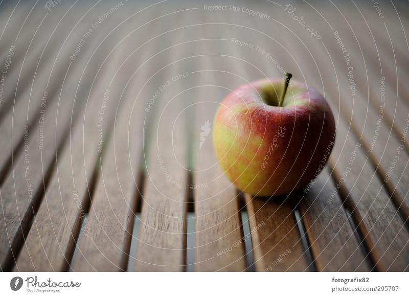 An apple a day Food Fruit Apple Bowl Lie Healthy Table Wooden table Building line Elstar Colour photo Multicoloured Copy Space left Copy Space top