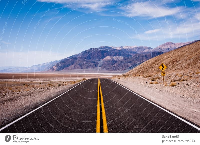 Black road in Death Valley National Park Vacation & Travel Mountain Nature Landscape Sky Deserted Tourist Attraction Street Blue Loneliness Adventure California