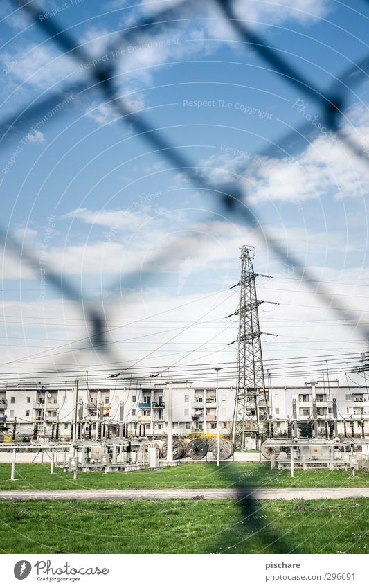 Living better II Energy industry Town House (Residential Structure) Industrial plant Gloomy Wire netting fence High voltage power line Colour photo