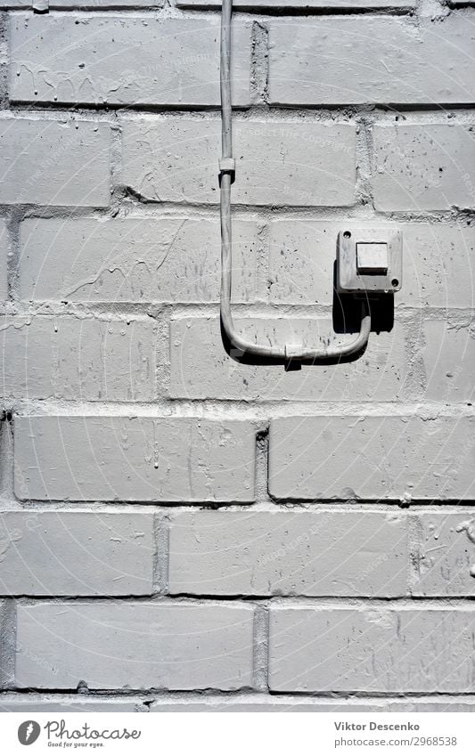 Electrical switch on the white wall House (Residential Structure) Technology Human being Hand Concrete Plastic Old Gray Black White Energy background vintage