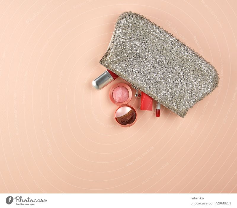 open silver clutch and cosmetics fell out of the middle Style Beautiful Cosmetics Make-up Lipstick Rouge Fashion Accessory Hip & trendy Gray Pink Red Elegant