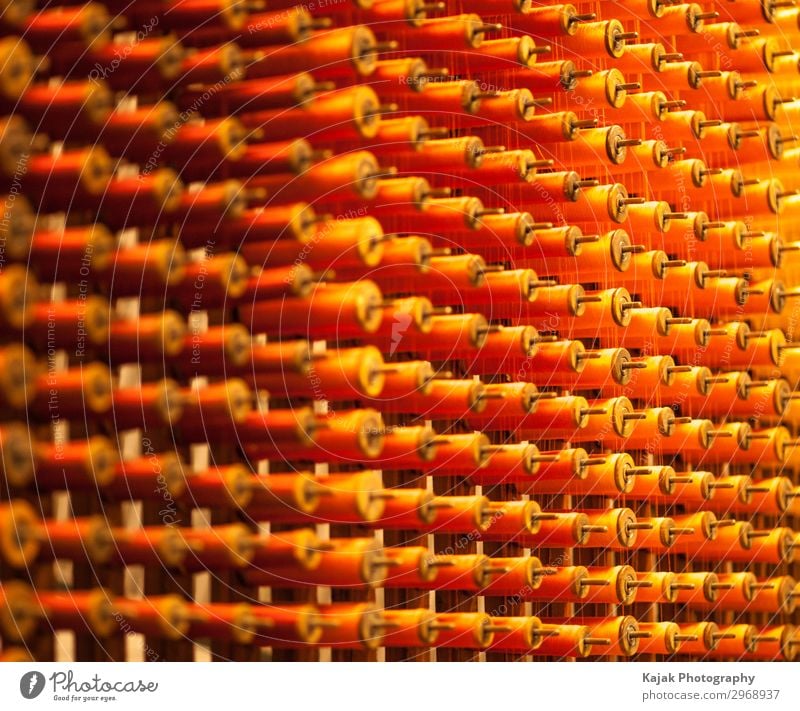 Yarn, manufacture of fabrics Rope Machinery Technology Exhibition Museum Athletic Beautiful Multicoloured Orange Red Interior shot Shallow depth of field