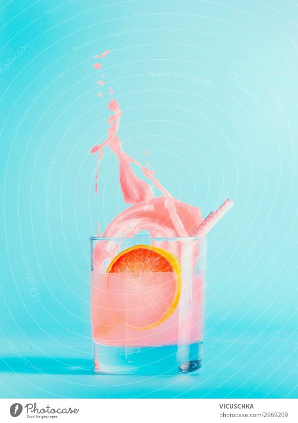 Summer drink in a glass on a blue background Food Fruit Beverage Drinking water Lemonade Juice Longdrink Cocktail Glass Style Design Healthy Eating Bar