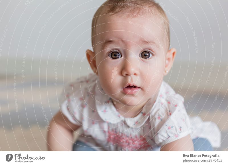 portrait of a beautiful baby girl at home. Family concept indoor Lifestyle Joy Happy Beautiful Face House (Residential Structure) Child Human being Baby Mother