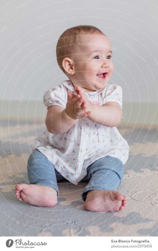 portrait of a beautiful baby girl at home. Family concept indoor Lifestyle Joy Happy Beautiful Face Flat (apartment) House (Residential Structure) Living room